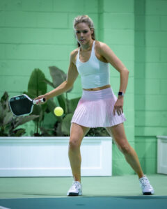 Pickleball player focused and ready to hit the ball