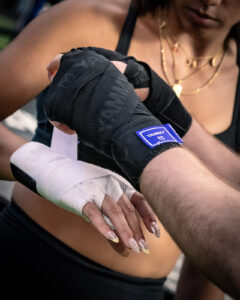 Close-up of boxing hand wraps during training session